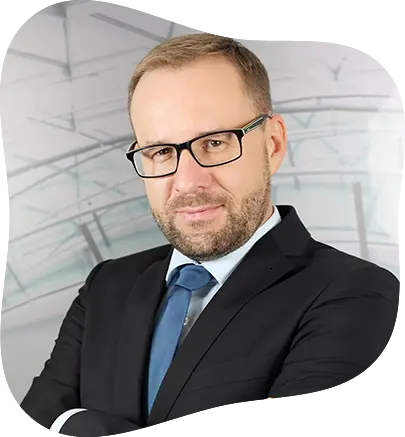Professional businessman in a black suit, blue tie, and glasses